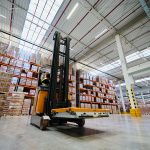 Reach truck STILL FM-X, systemy regałowe i platformy transportowe STILL w Kellogg's